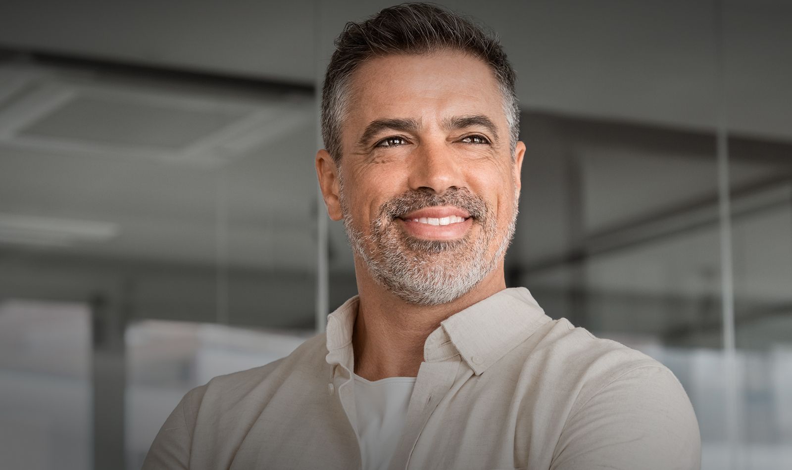 Smiling man in a professional setting.